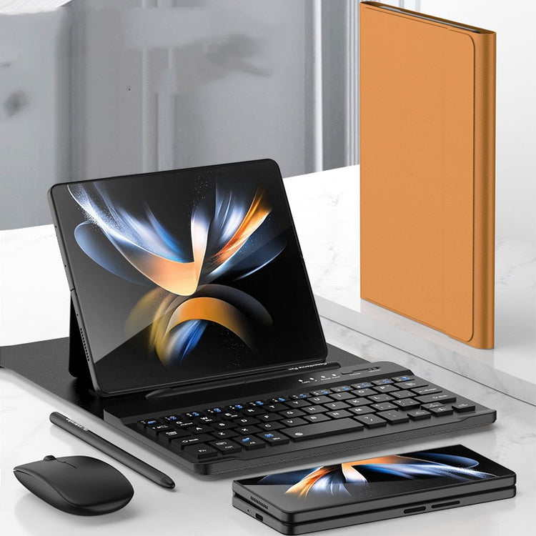 a laptop and phone on a table