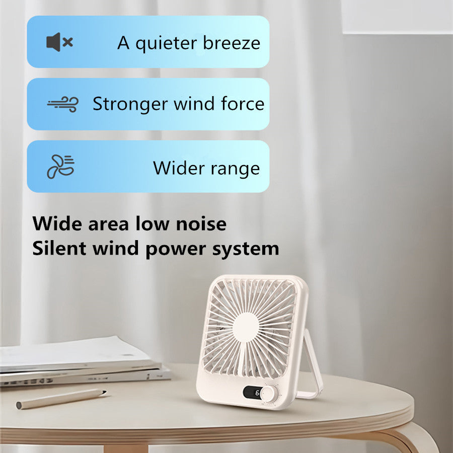 a small white fan on a table