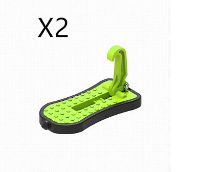 a green and black foot peg