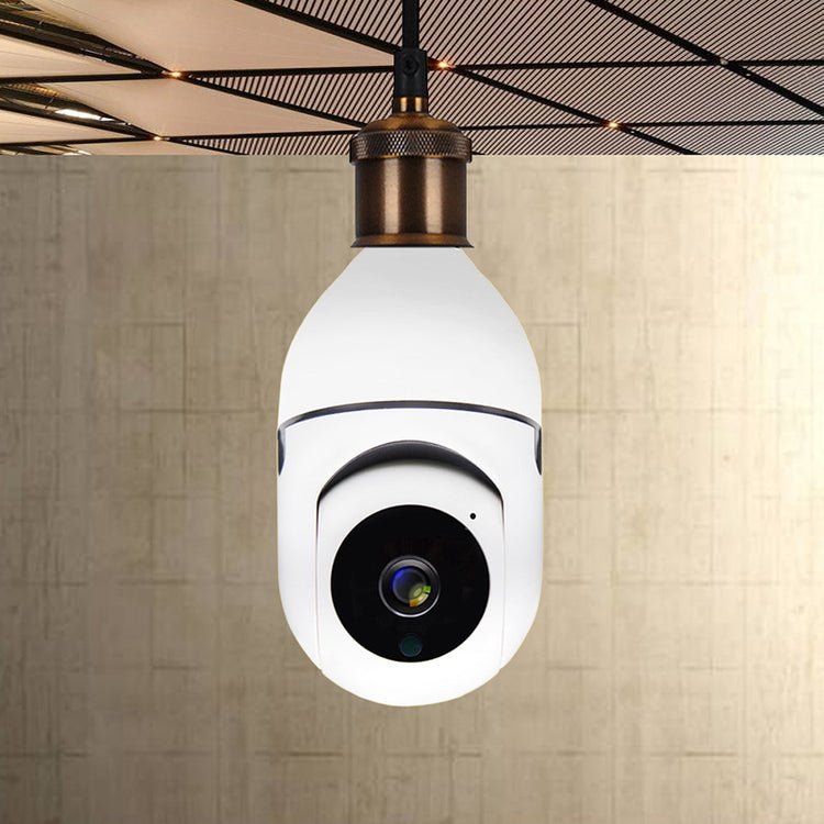 a white dome shaped camera from a ceiling