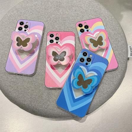 a group of cell phones with butterflies on them