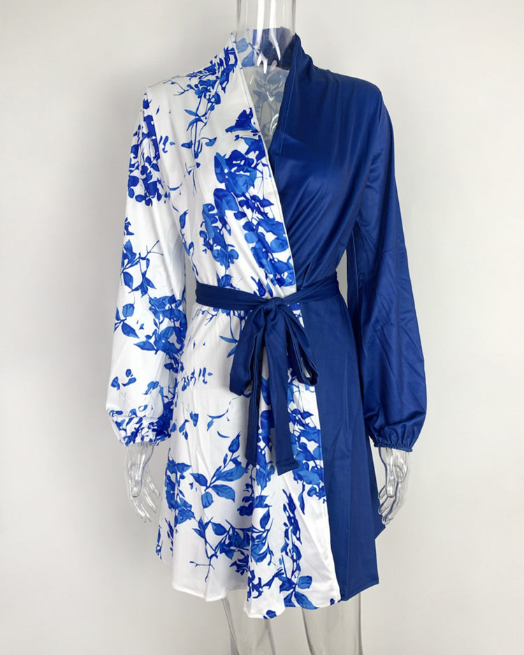 a blue and white robe on a mannequin