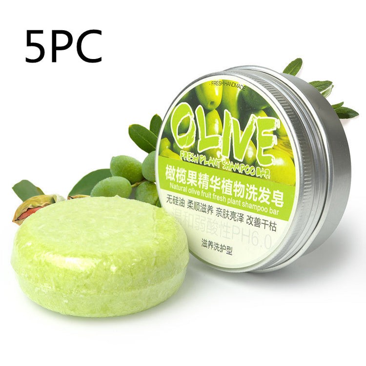 a round green soap with a round container next to a round green object