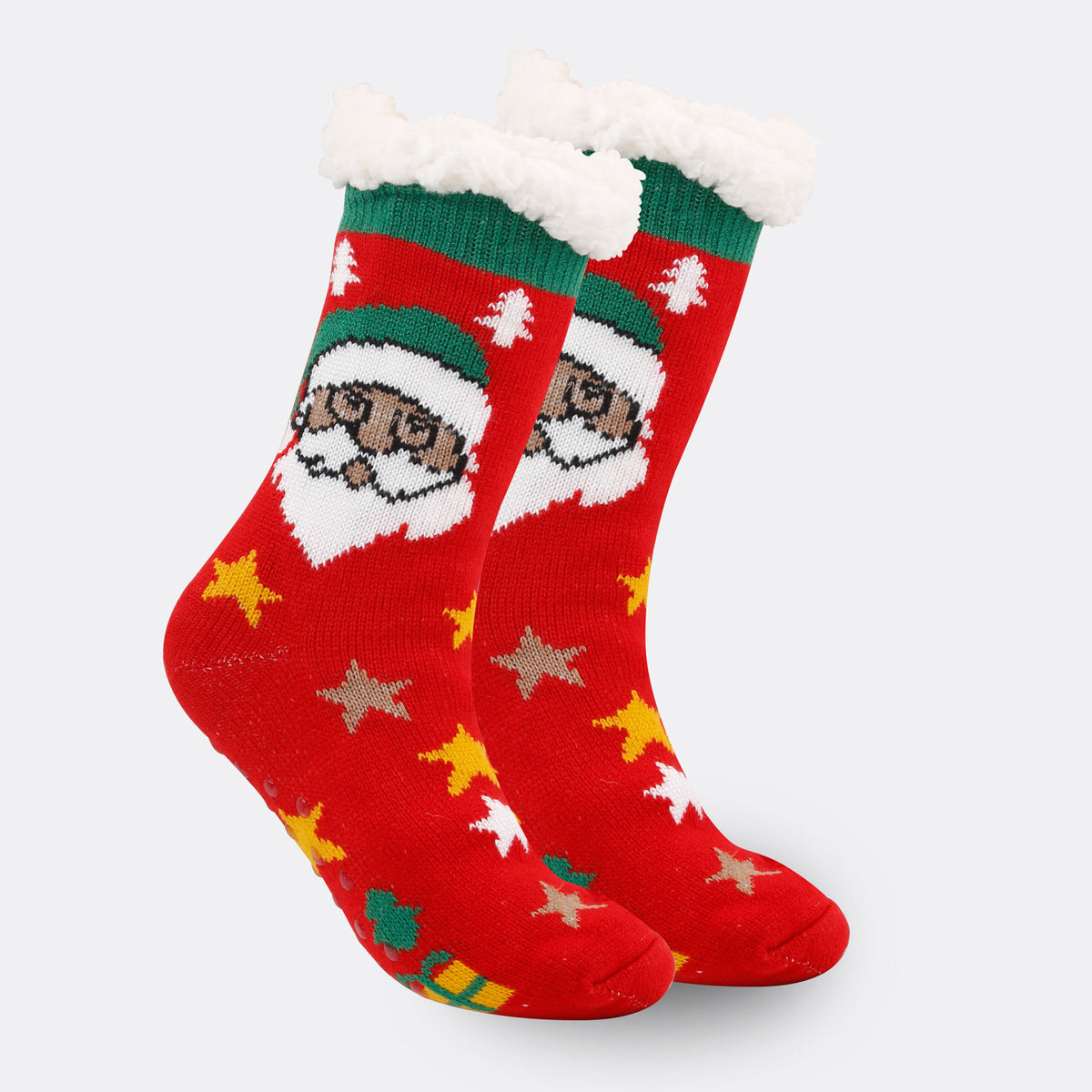 a pair of red socks with a santa claus face