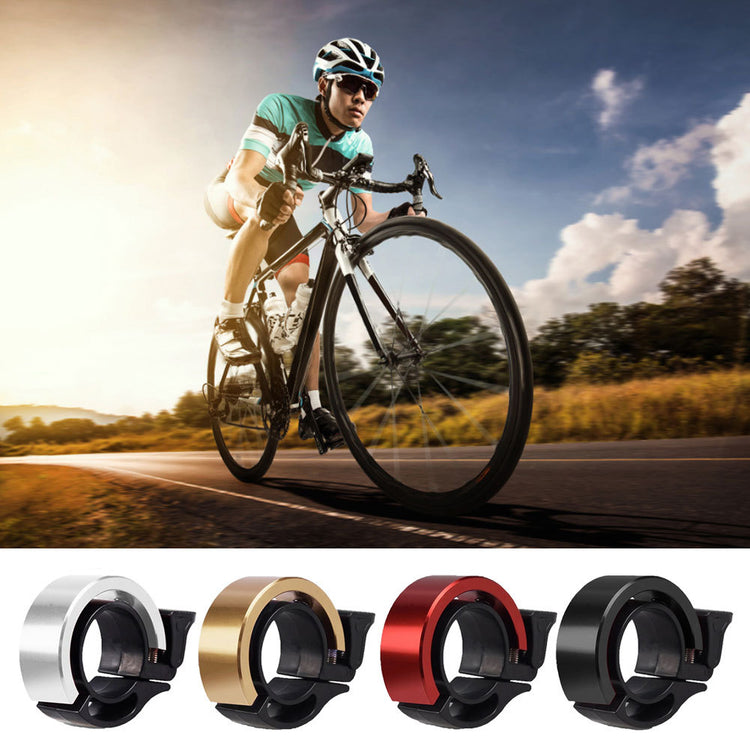 a man riding a bicycle on a road