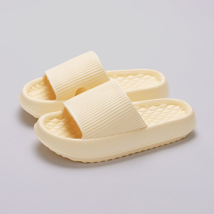 a pair of white slippers