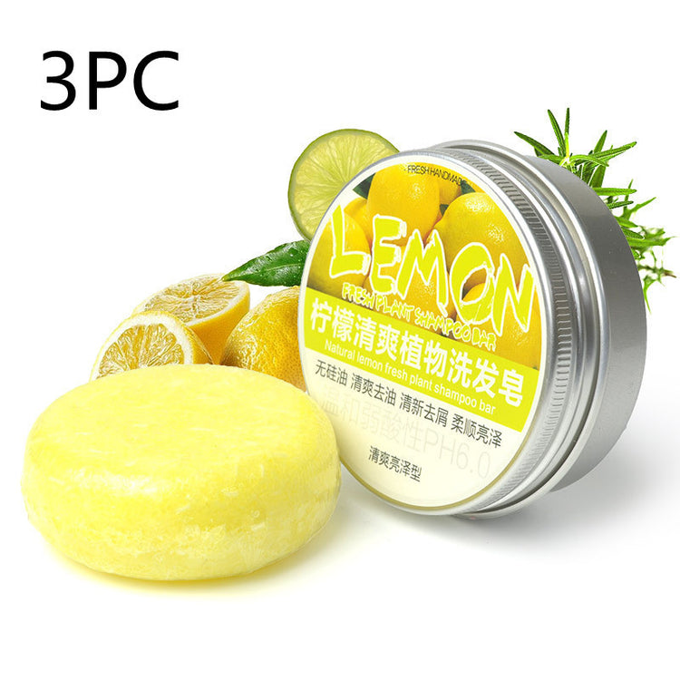 a round yellow container with a round yellow object next to a round yellow object