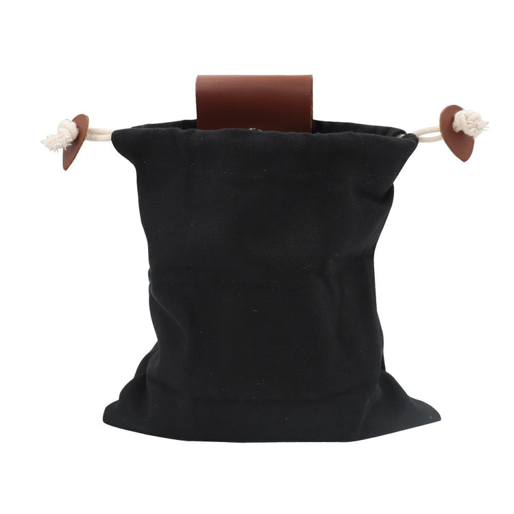 a black bag with brown handles