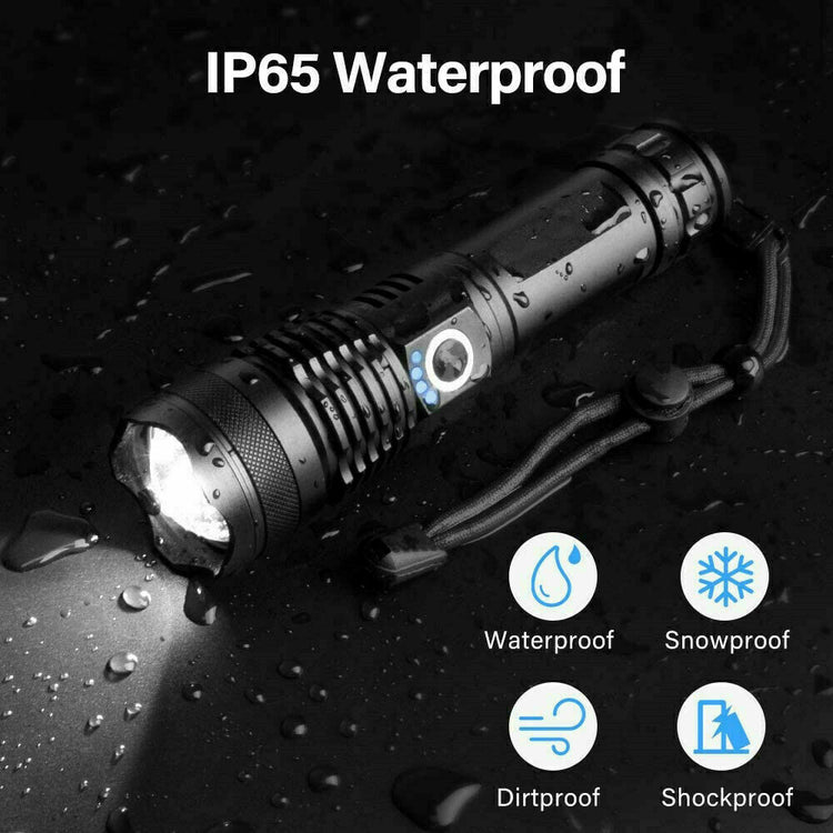 a flashlight with water drops on it