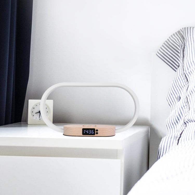 a alarm clock on a nightstand