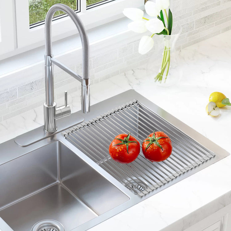 a sink with tomatoes in it