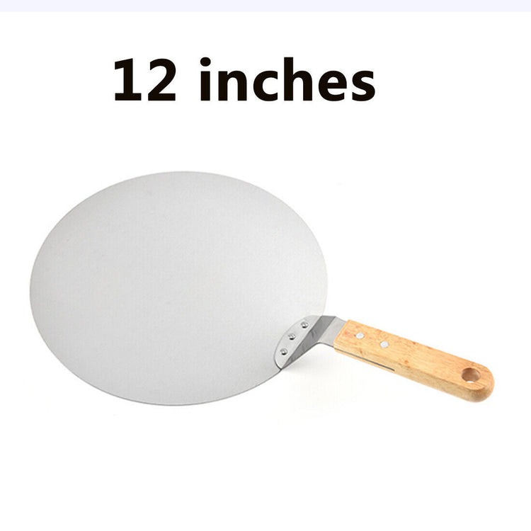 a white pizza pan with a wooden handle