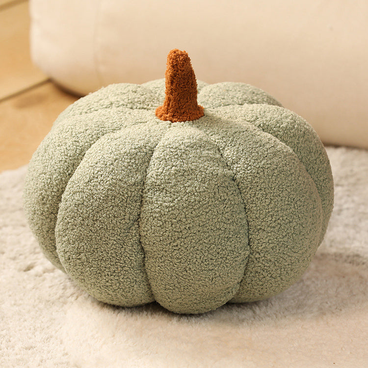 a green pumpkin on a carpet