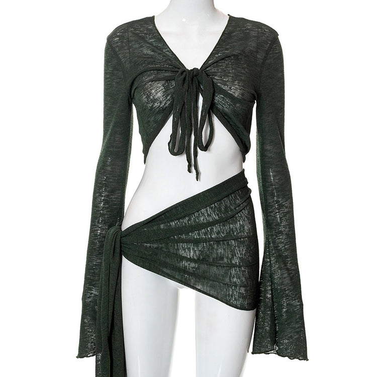 a green dress on a mannequin