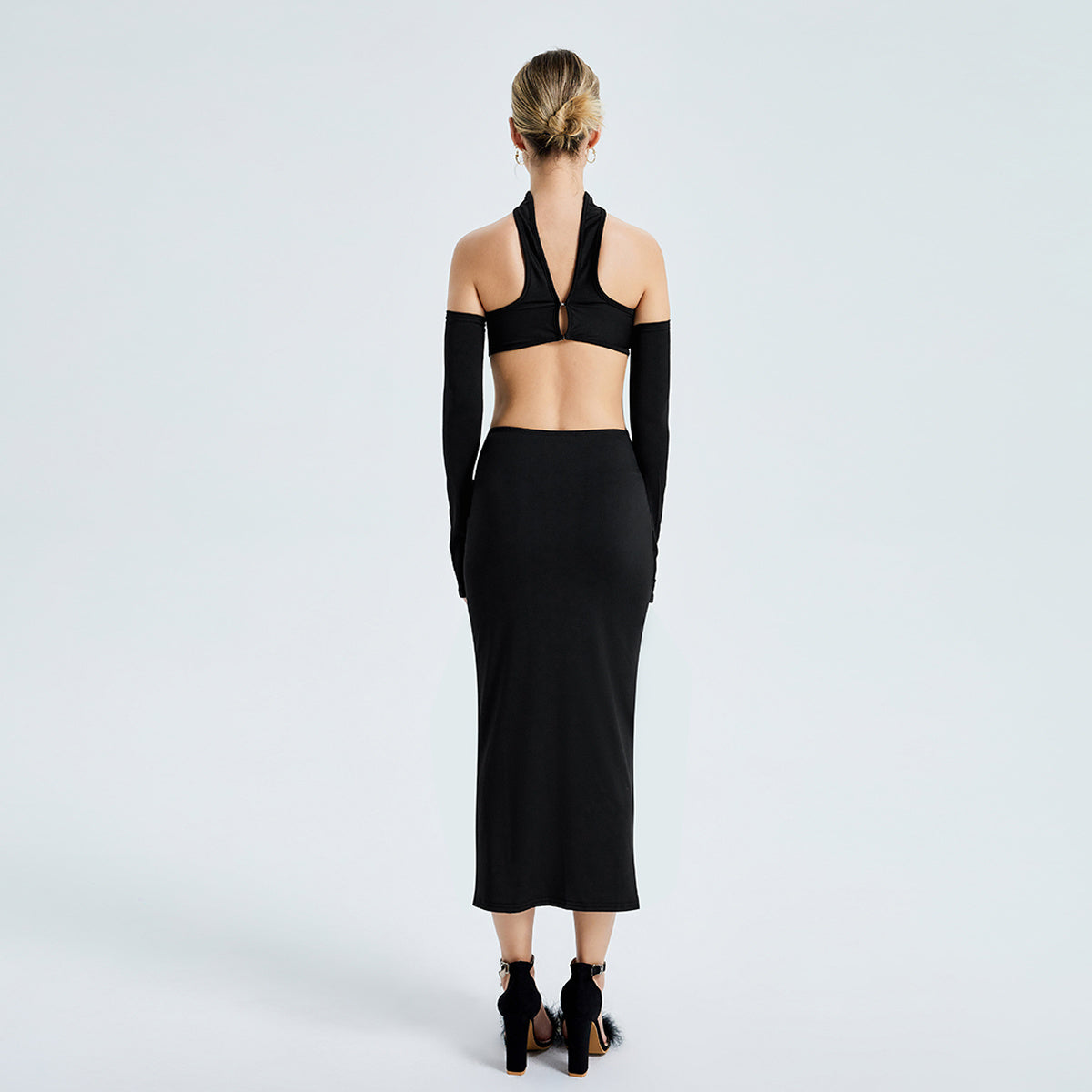 a woman in a black dress