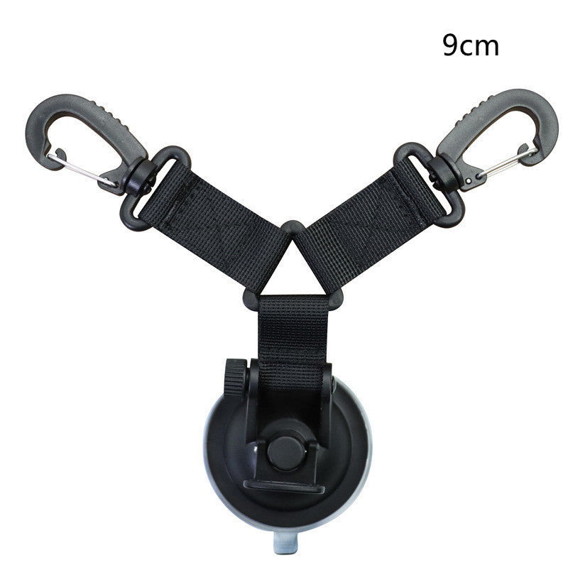a black strap with a black plastic holder