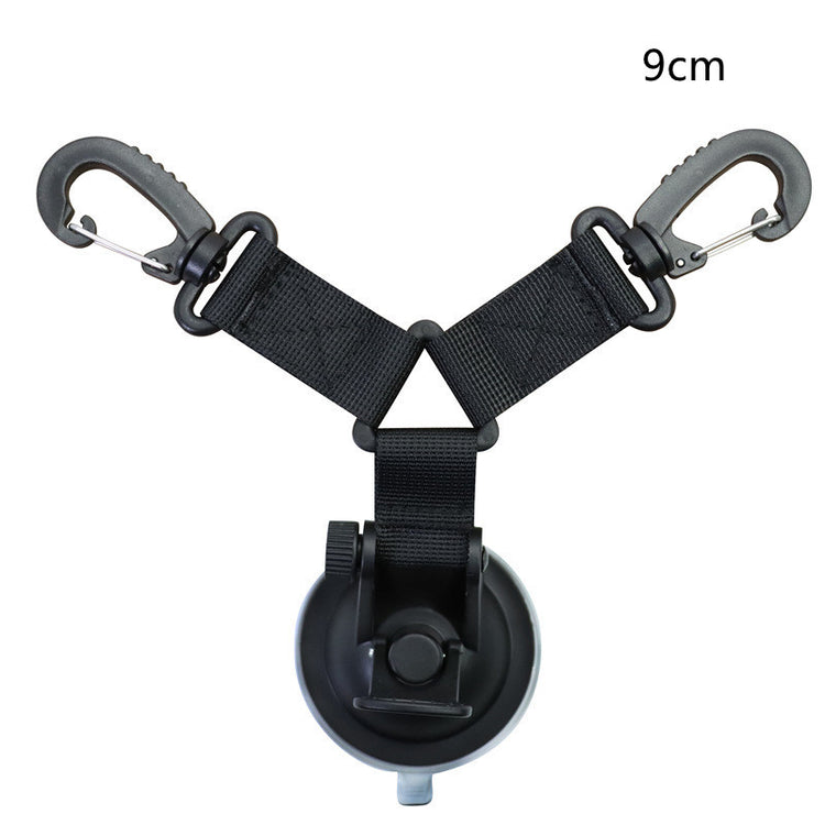 a black strap with a black plastic holder