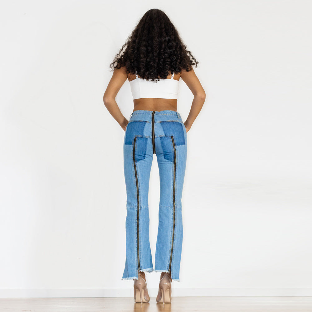 a woman in blue jeans