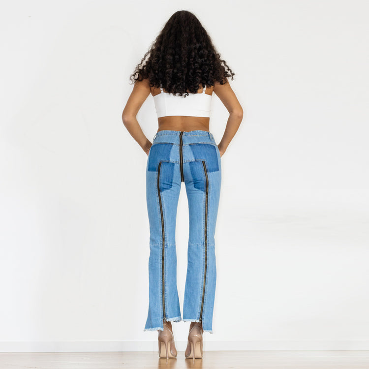 a woman in blue jeans