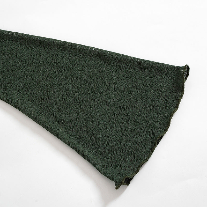 a green fabric on a white background