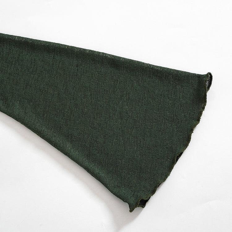 a green fabric on a white background