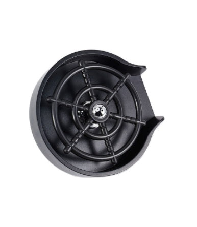 a black round object with a black handle