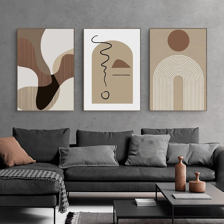 a couch with a coffee table and art on the wall