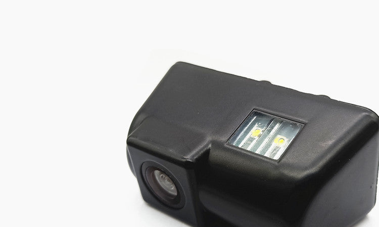 a black camera with a lens