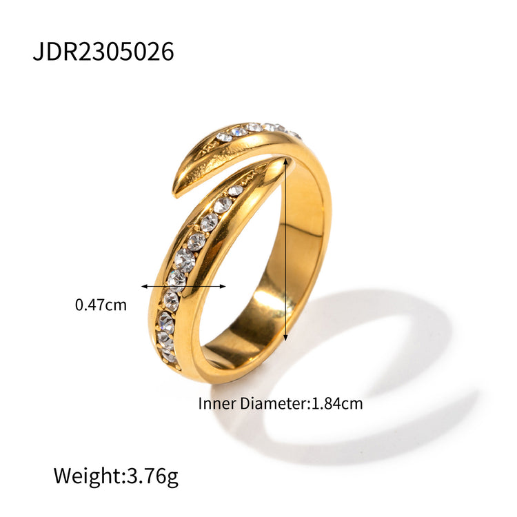 a gold ring with diamonds