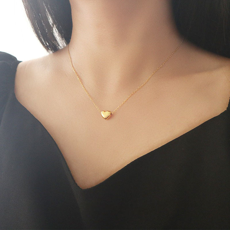 a person wearing a necklace
