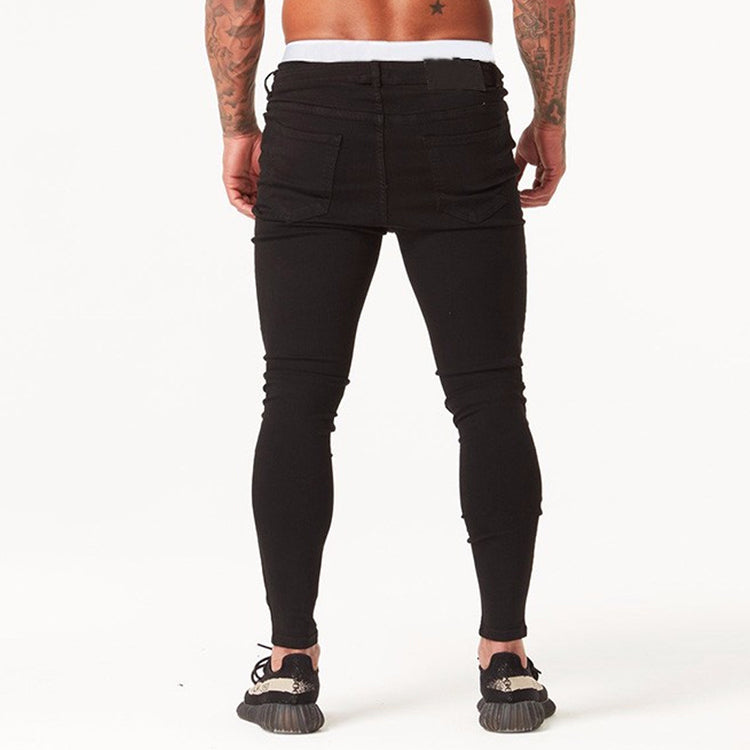 a man wearing black jeans