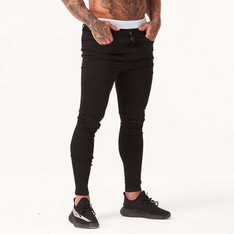 a man with tattoos on his stomach