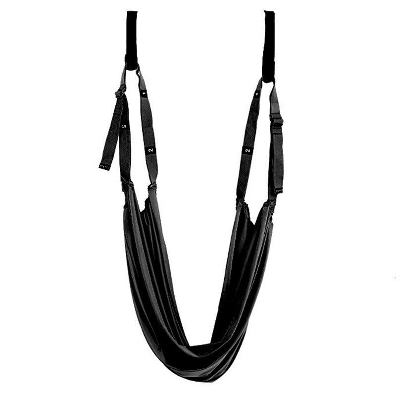 a black hammock from a wall