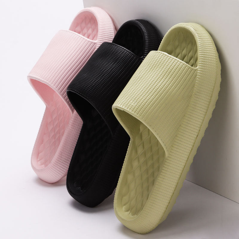 a group of sandals on a white surface