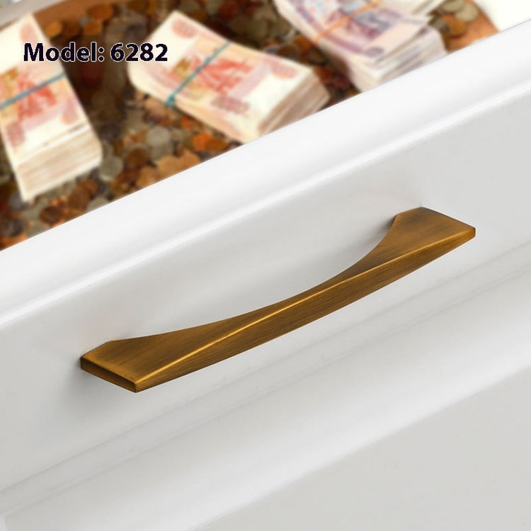 a close-up of a drawer handle