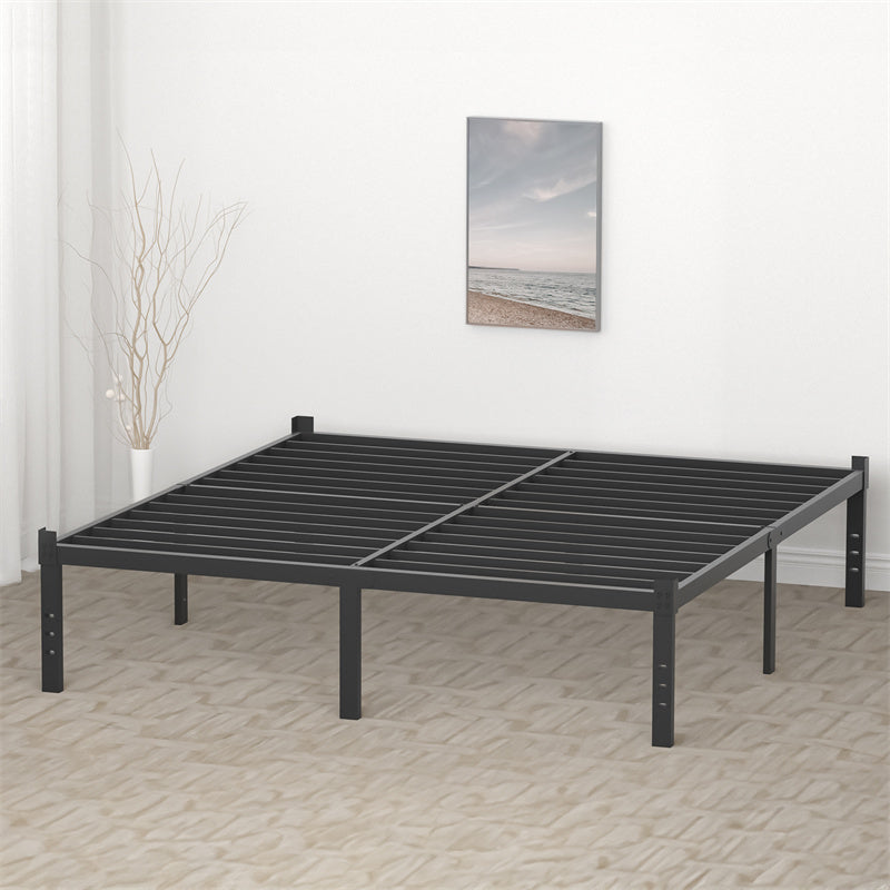 a black bed frame in a room