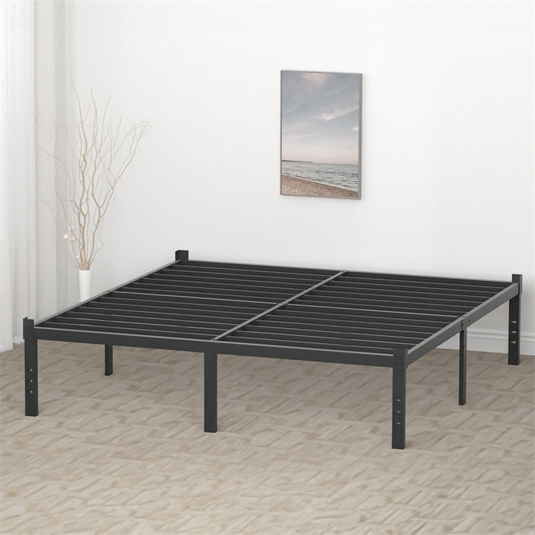 a black bed frame in a room