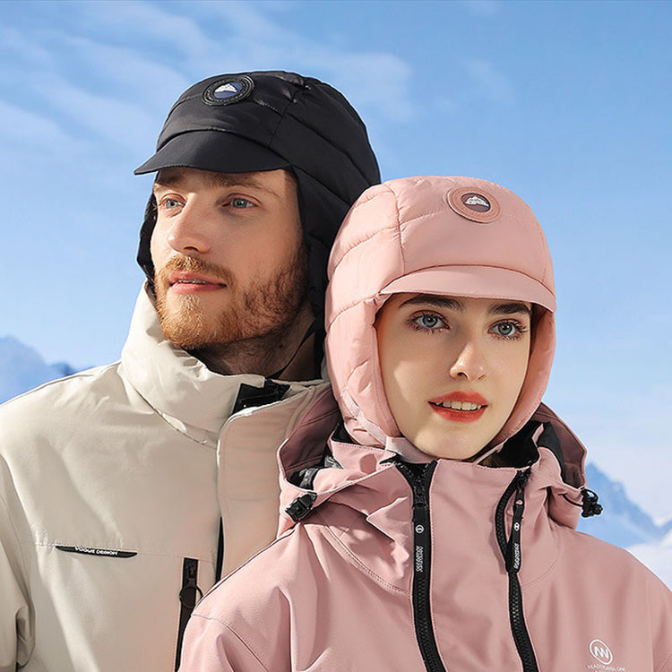 a man and woman in winter clothes