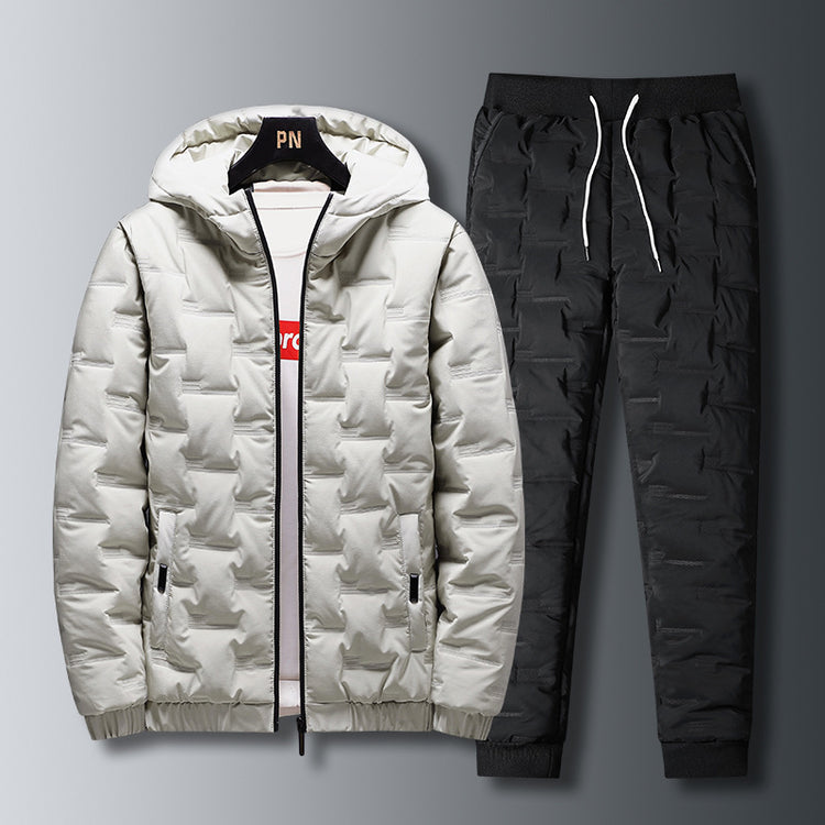 a white jacket and black pants