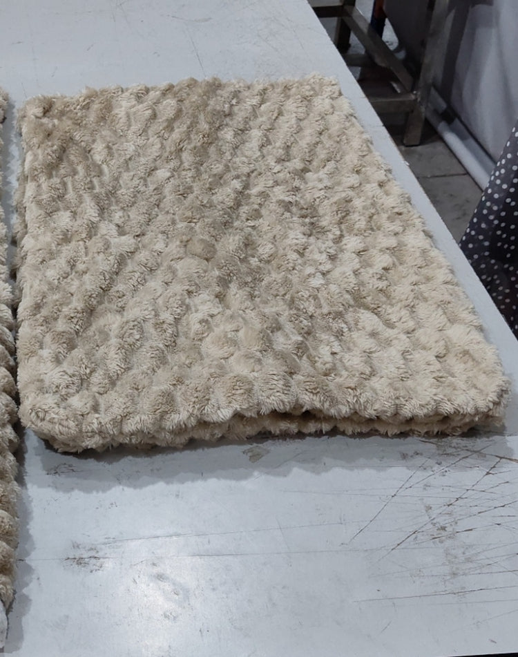 a white rug on a table