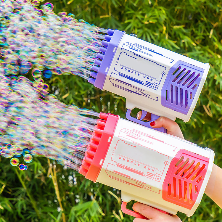 two hands holding plastic water guns with bubbles coming out of them