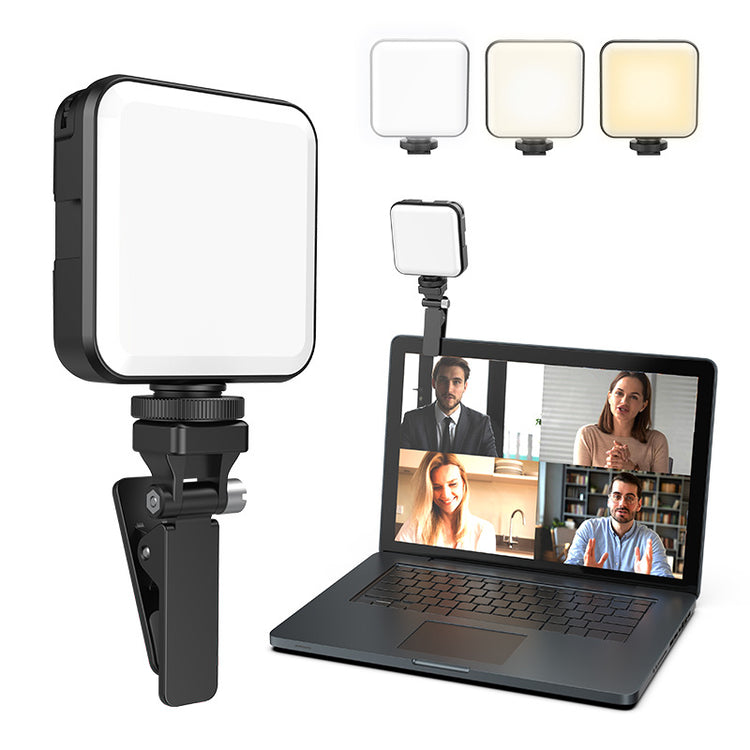 a laptop and a light fixture