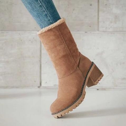 a person's leg and boot