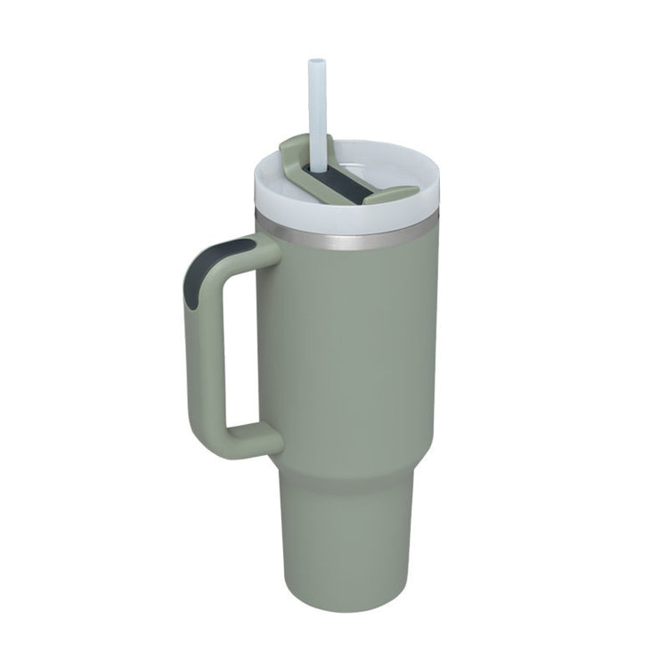 a grey and white tumbler with a straw