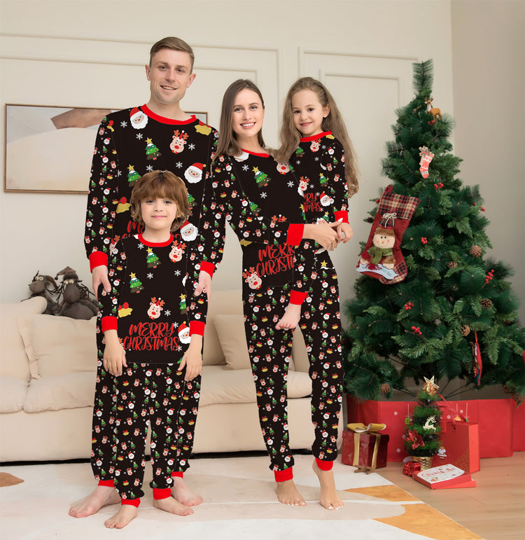 a family wearing pajamas in front of a christmas tree