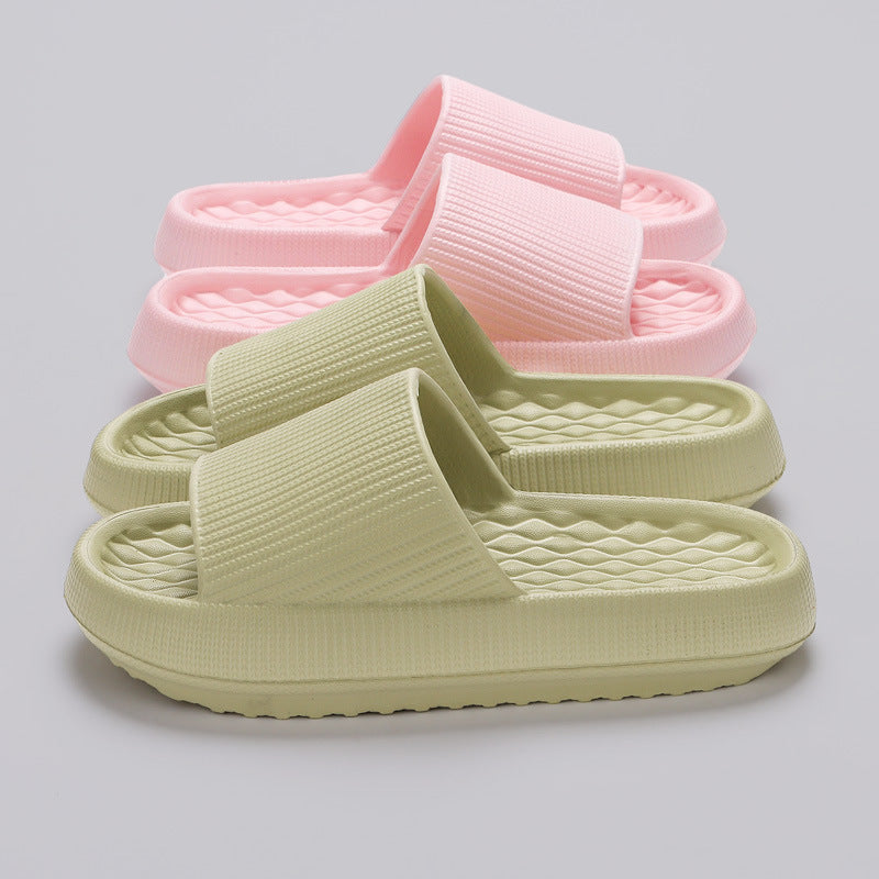 a group of pink and green slippers
