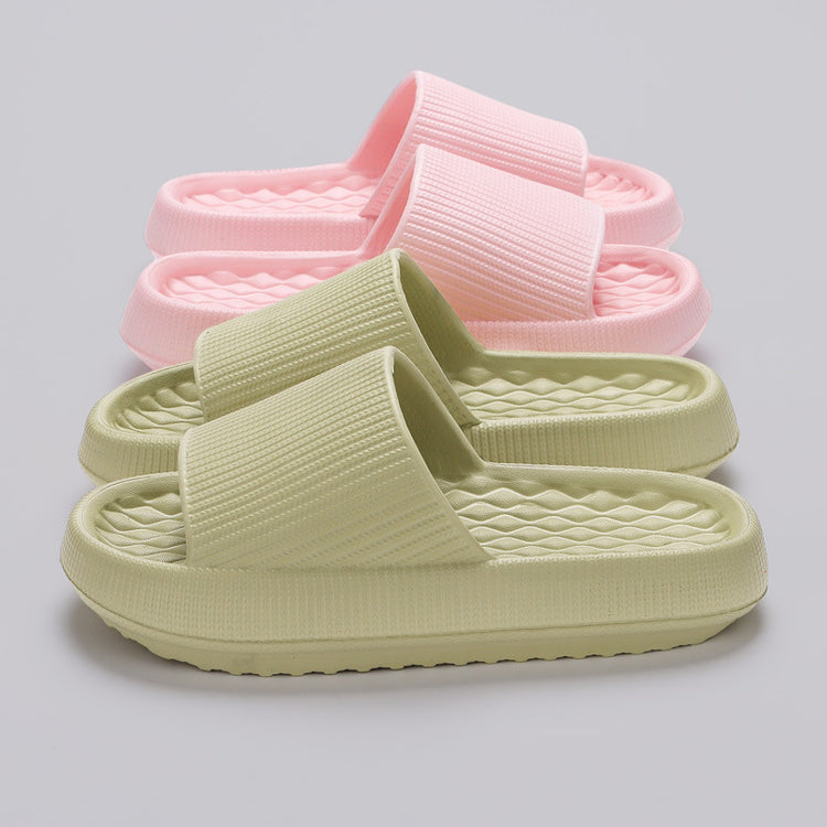 a group of pink and green slippers