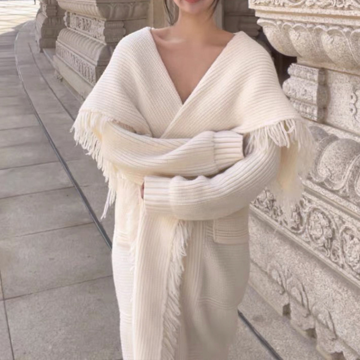 a woman in a white robe