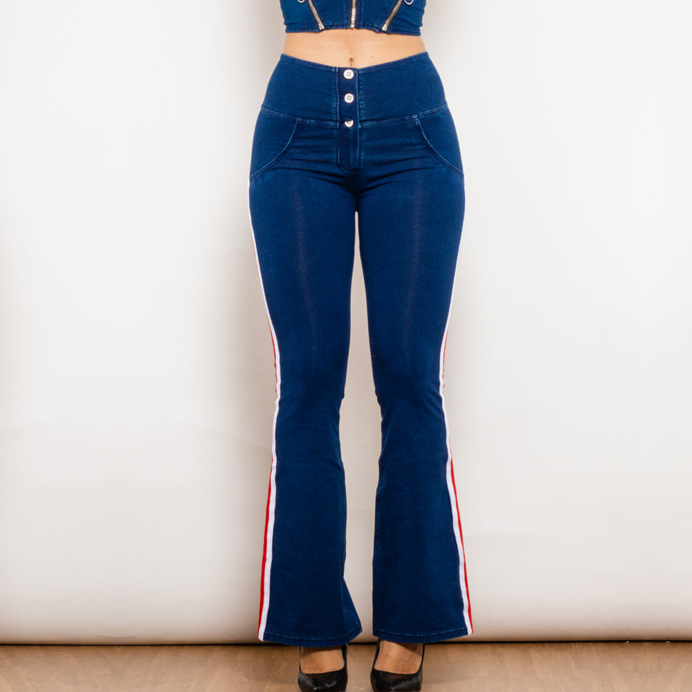 a woman wearing blue jeans