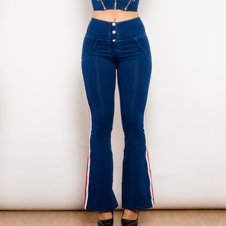 a woman wearing blue jeans